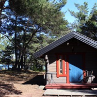You'll sleep in a small cabin in Sandösund